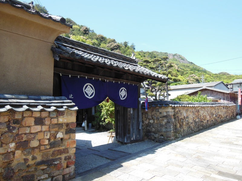 A tonbai wall of reclaimed kiln bricks lining a street in Arita, Saga Prefecture, Japan